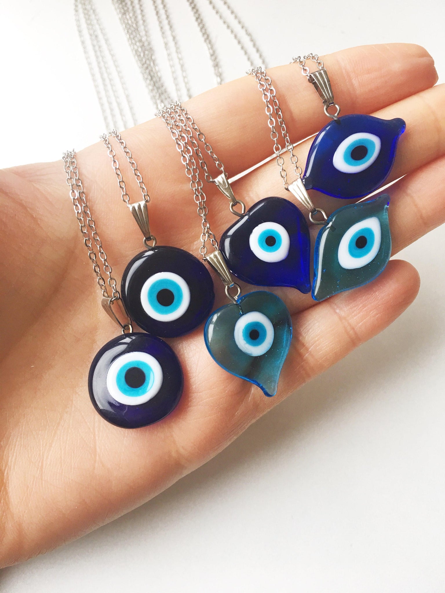 thumbnail interactive-video image 1 of Evil Eye Leather Necklace - Blue Turkish Glass Beaded Rope Charm For Luck & Healing 1 of 2